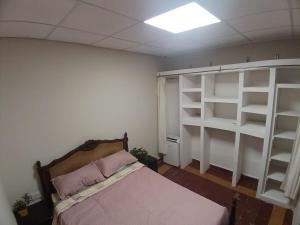 Giường trong phòng chung tại La Casona Hostel