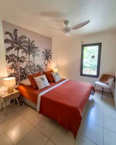 En eller flere senge i et værelse på Le Reflet de l'Etang