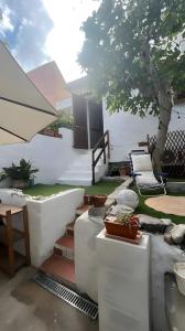 Khu vực ghế ngồi tại Mia Apartment- Seaside with garden