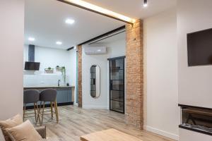 TV a/nebo společenská místnost v ubytování Sentir Jaén II