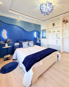 Ένα ή περισσότερα κρεβάτια σε δωμάτιο στο Agape la maison de l amour