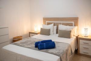 Ένα ή περισσότερα κρεβάτια σε δωμάτιο στο James Sun