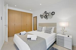 En eller flere senge i et værelse på Sea & The City Luxury Apartment - Lagos + 27 billeder