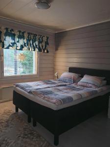 Postel nebo postele na pokoji v ubytování Villa Wältti