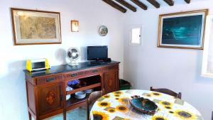 Μια τηλεόραση ή/και κέντρο ψυχαγωγίας στο Lerici - Il Terrazzino Di Zia