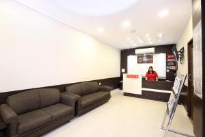 Χώρος καθιστικού στο Hotel O Basera Boutique