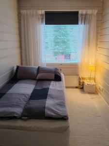 Postel nebo postele na pokoji v ubytování Villa Wältti