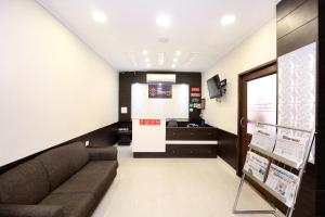 Μια τηλεόραση ή/και κέντρο ψυχαγωγίας στο Hotel O Basera Boutique