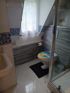 Koupelna v ubytování Maison de normandy chambre