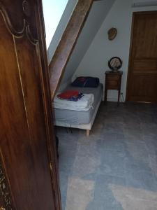 Postel nebo postele na pokoji v ubytování Maison de normandy chambre