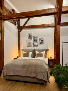 Ένα ή περισσότερα κρεβάτια σε δωμάτιο στο Loft Apartment