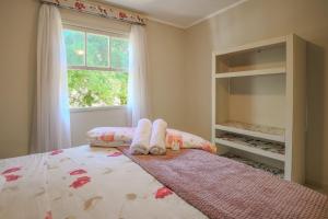 Ένα ή περισσότερα κρεβάτια σε δωμάτιο στο Quinta do Vale - Casa de Boneca: Piscina, lago, caiaque, cascata +25 φωτογραφίες