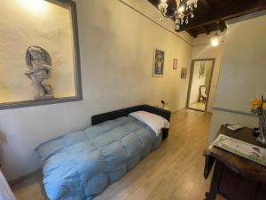 Giường trong phòng chung tại Ghibellina 4