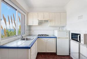 Η κουζίνα ή μικρή κουζίνα στο Apartamento Puerto Estaca 3