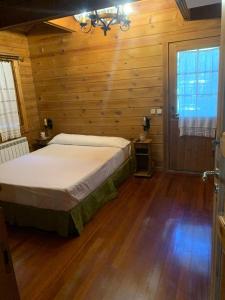 Una cama o camas en una habitación de Mirador la maliciosa