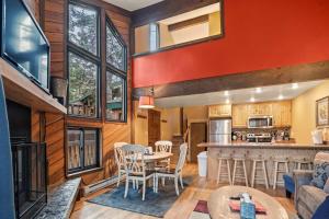 a kitchen and living room with a table and chairs at Ski Access SS7B Retreat Pet Friendly in Brian Head