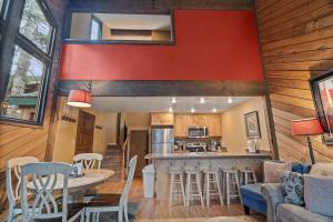 a kitchen and living room with a table and chairs at Ski Access SS7B Retreat Pet Friendly in Brian Head