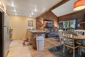 a kitchen and dining room with a table and a dining room at Ski Access SS7B Retreat Pet Friendly in Brian Head