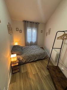 Ένα ή περισσότερα κρεβάτια σε δωμάτιο στο LE PIED A TERRE SELESTADIEN +3 φωτογραφίες