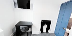 TV a/nebo společenská místnost v ubytování The Burford Hideaway