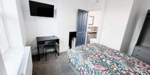 TV a/nebo společenská místnost v ubytování The Burford Hideaway