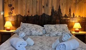 Ένα ή περισσότερα κρεβάτια σε δωμάτιο στο Casa da Curuxeira