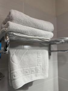 Ένα ή περισσότερα κρεβάτια σε δωμάτιο στο DREAM Hotel Kyiv