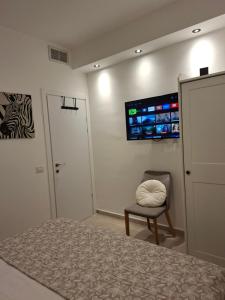 Μια τηλεόραση ή/και κέντρο ψυχαγωγίας στο K Home כרמי גת