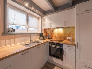 Køkken eller tekøkken på exklusives skandinavisches Ferienhaus