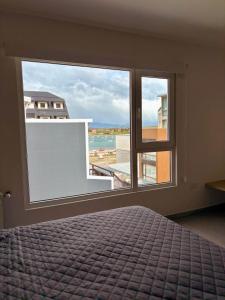 En eller flere senge i et værelse på Gente del Sur - Avenida