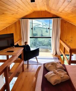 Istumisnurk majutusasutuses Recanto dos Canários - CHALÉ 2