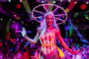 a woman in a costume at a party at Riu Palace Peninsula - All Inclusive in Cancún +20 photos