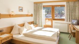 Postel nebo postele na pokoji v ubytování Bellamonte