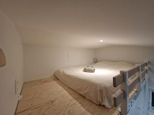 Una cama o camas en una habitación de Duplex studio