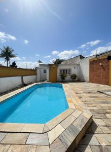 Swimmingpoolen hos eller tæt på Pousada Elite Residence - Itanhaém