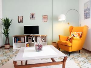 Μια τηλεόραση ή/και κέντρο ψυχαγωγίας στο Appartamento inCentro +21 φωτογραφίες