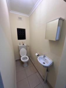 Et badeværelse på Dube Villa