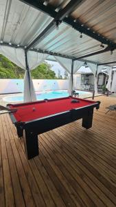 Τραπέζι μπιλιάρδου στο Pousada Bahamas Sc