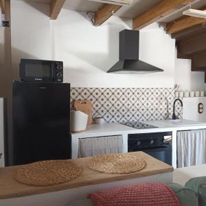 Kuchyň nebo kuchyňský kout v ubytování CasaManuela