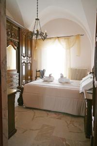 Ένα ή περισσότερα κρεβάτια σε δωμάτιο στο A Casa di Nonna Nunzia - Centro di Gravina - 20min da Matera