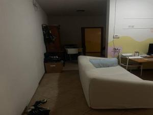 a living room with a couch and a table at SnowPeak Residence in Dresano