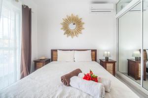 Giường trong phòng chung tại Villa Pauline