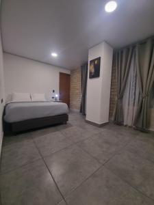 Giường trong phòng chung tại Andes Coliving +11 ảnh