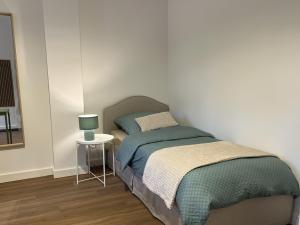 Ένα ή περισσότερα κρεβάτια σε δωμάτιο στο Business Apartments - Hof Wanstrath - select2stay