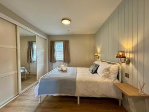 En eller flere senge i et værelse på Priory Castle Bungalow, Tynemouth