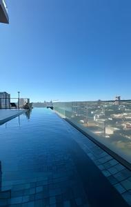 Bazén v ubytování 23 Andar no Vertigo Premium com Vista Espetacular nebo v jeho okolí