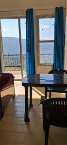 Балкон или терраса в Bhagwati Homestay