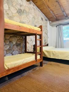 Postel nebo postele na pokoji v ubytování Cosmoqui Casa Boutique