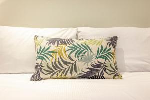 Ένα ή περισσότερα κρεβάτια σε δωμάτιο στο The Lodge House - By Elie