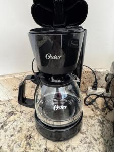 a coffee maker sitting on top of a counter at Apartamento la 20 in Tijuana